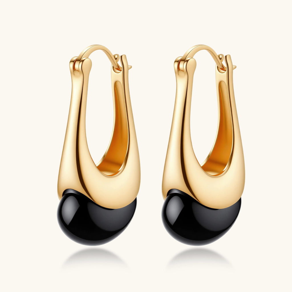 Angled view of Midnight Agate Drop Earrings by Averuna Jewellery