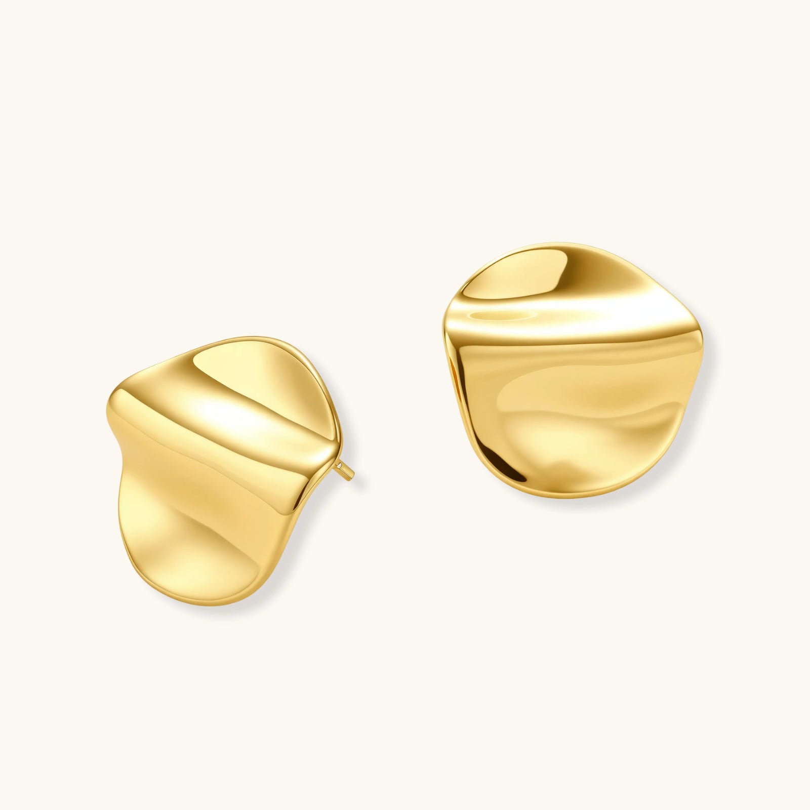 Angled view of Flow Statement Stud Earrings by Averuna Jewellery