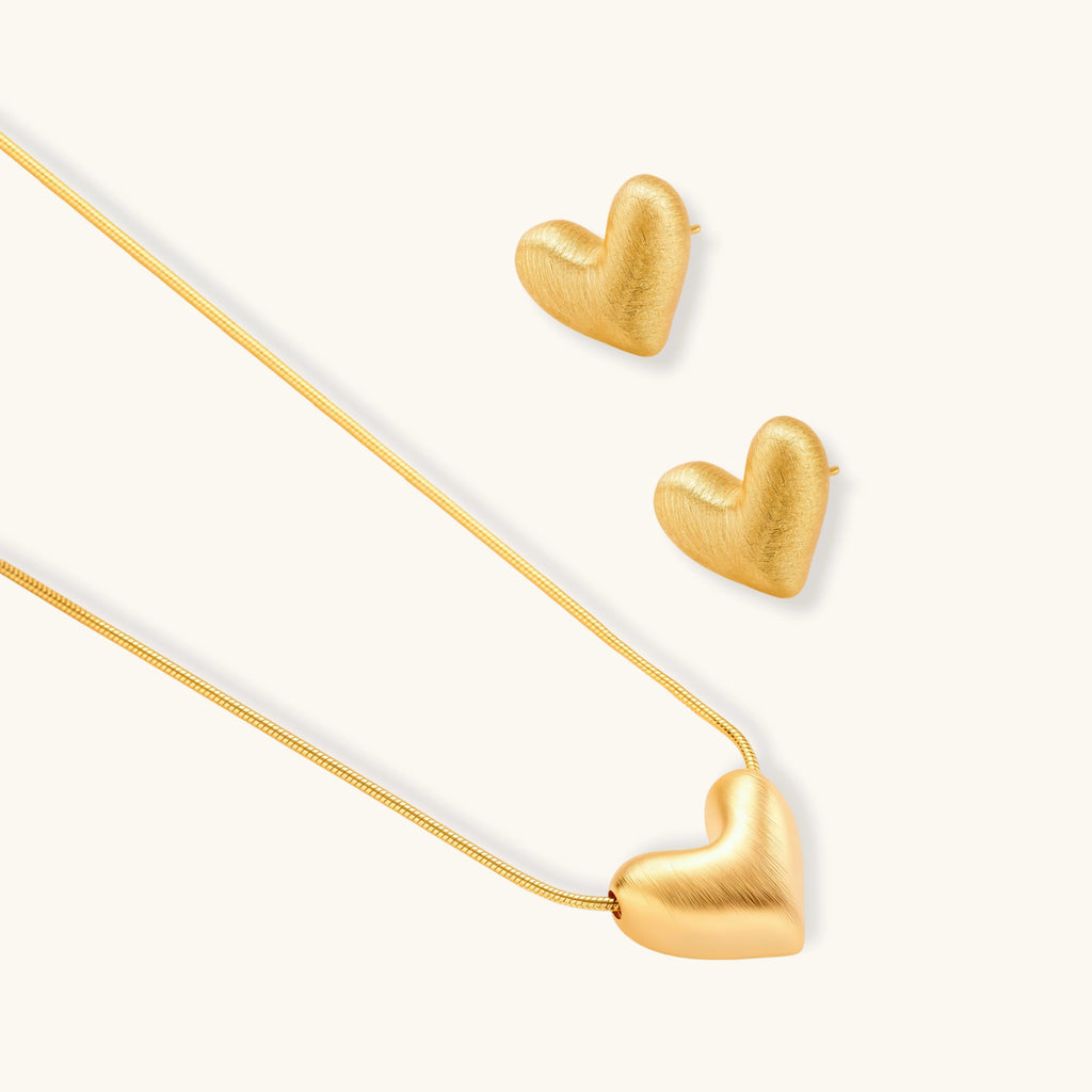 Angled view of Golden Heart Necklace by Averuna Jewellery