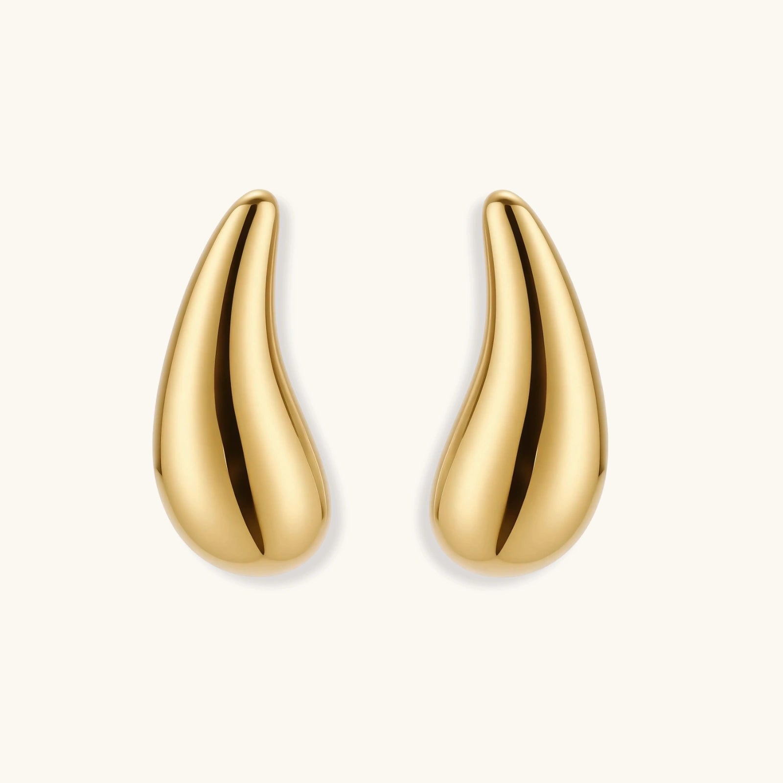 Close-up detail of Golden Teardrop Stud Earrings by Averuna Jewellery