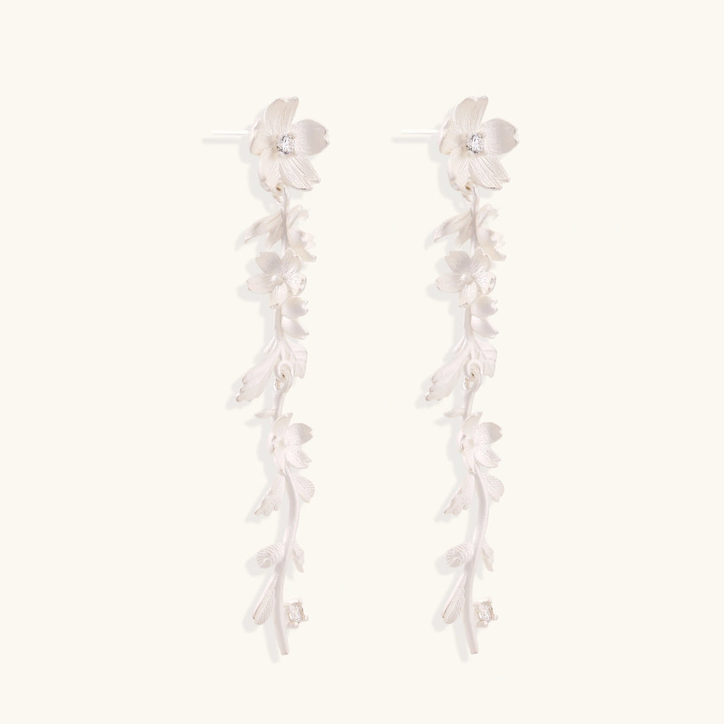 Angled view of Garden Bloom Drop Earrings by Averuna Jewellery