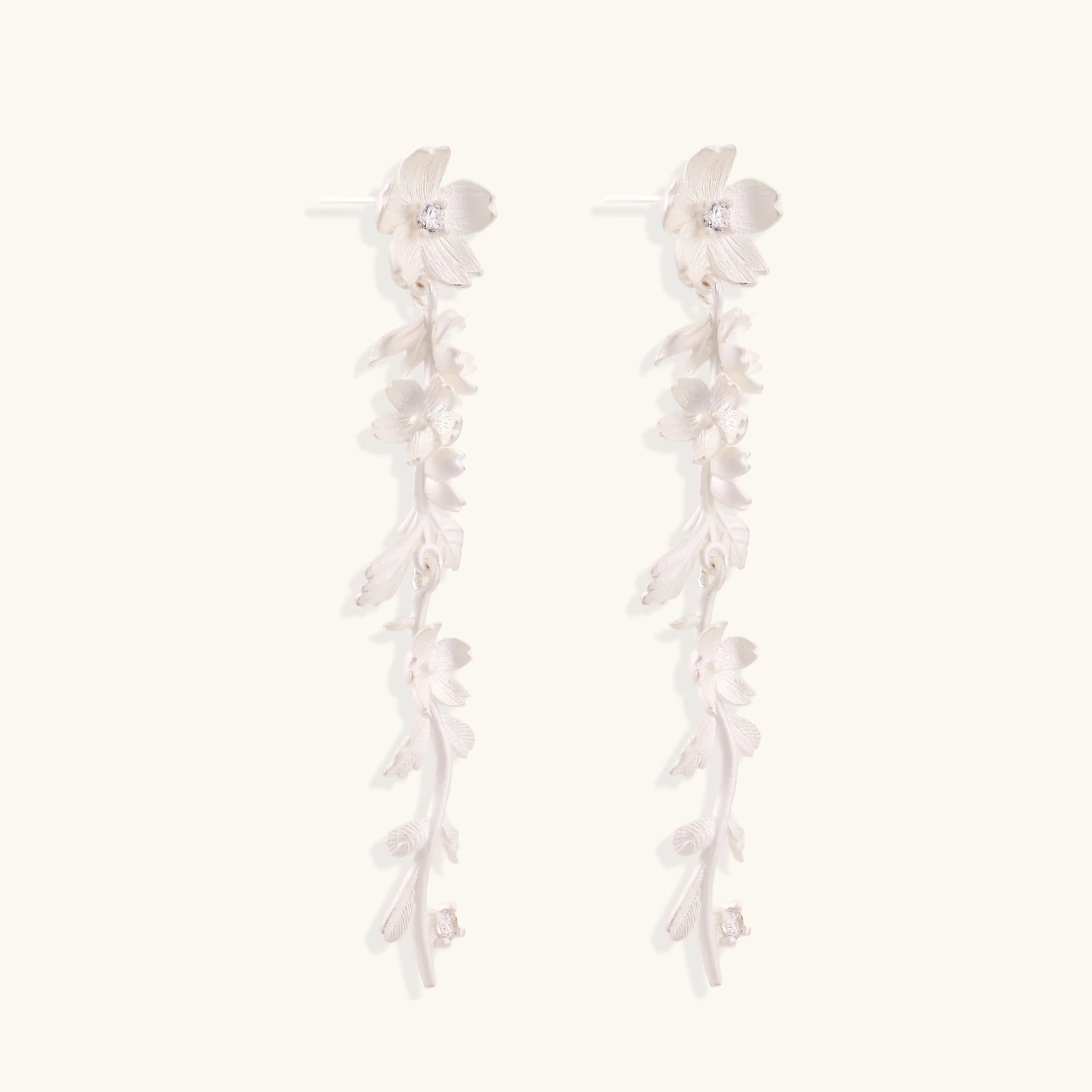 Angled view of Garden Bloom Drop Earrings by Averuna Jewellery