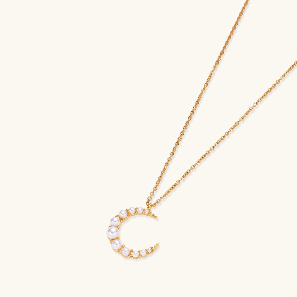 Angled view of Luna Pearl Crescent Necklace by Averuna Jewellery