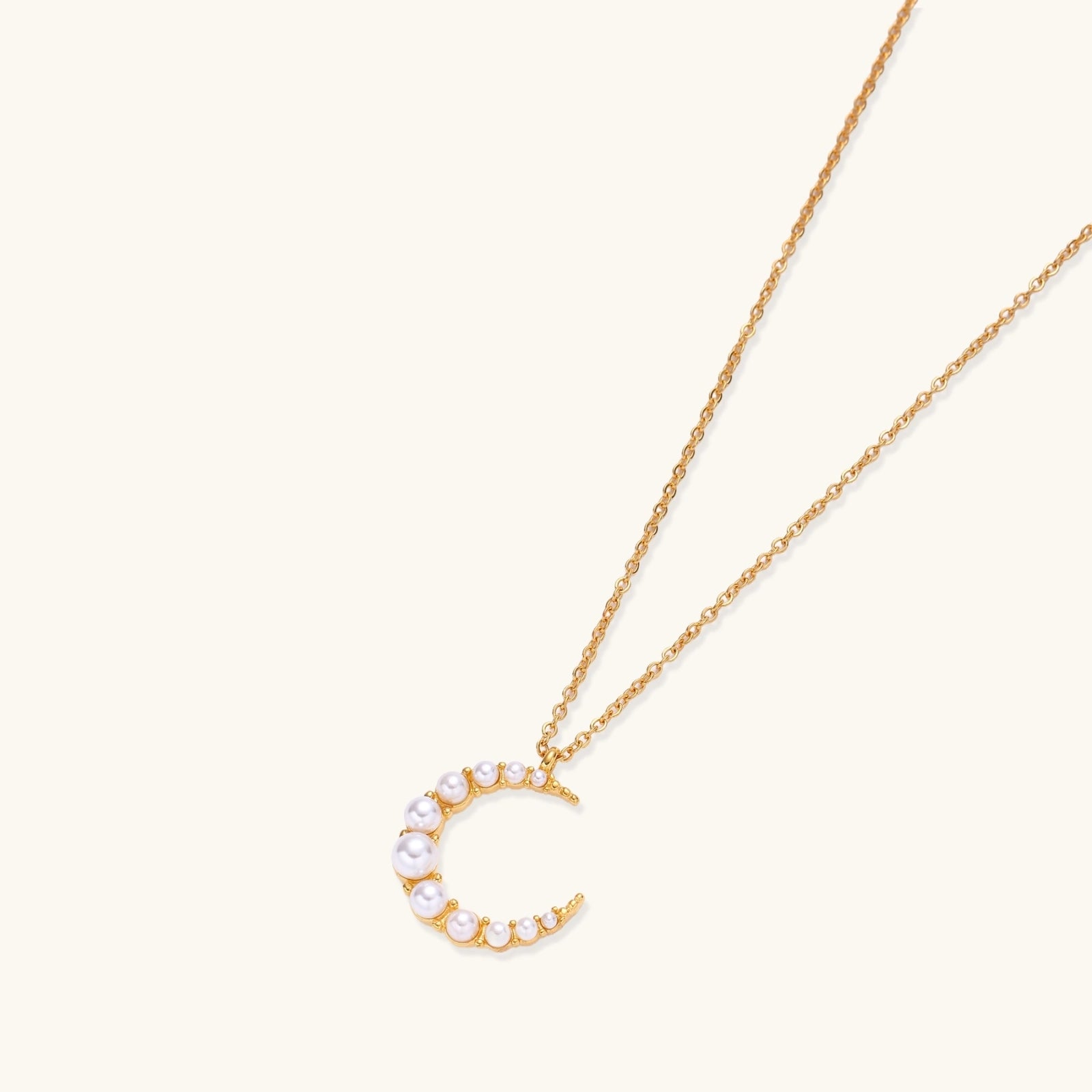 Angled view of Luna Pearl Crescent Necklace by Averuna Jewellery