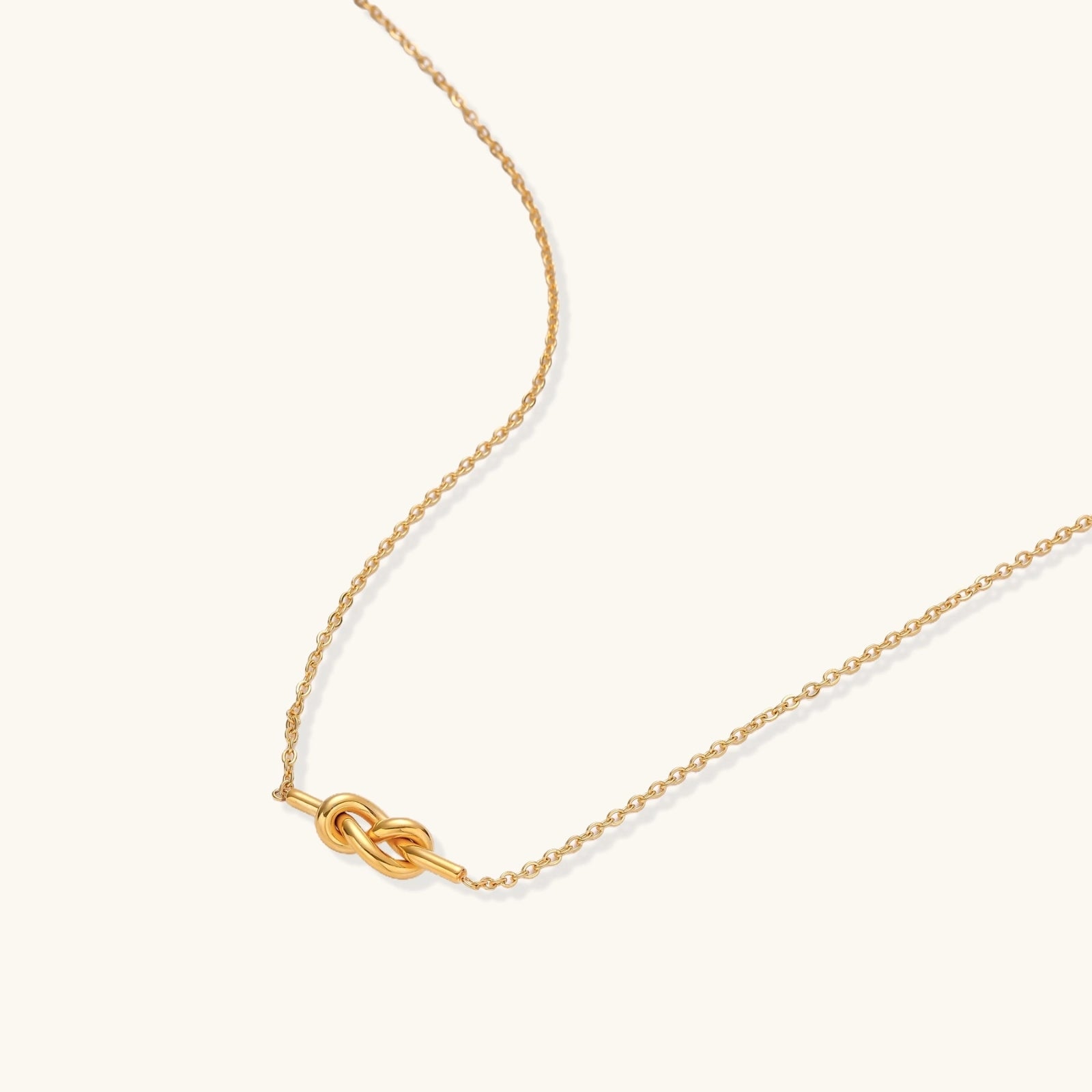 Angled view of Unity Knot Necklace by Averuna Jewellery