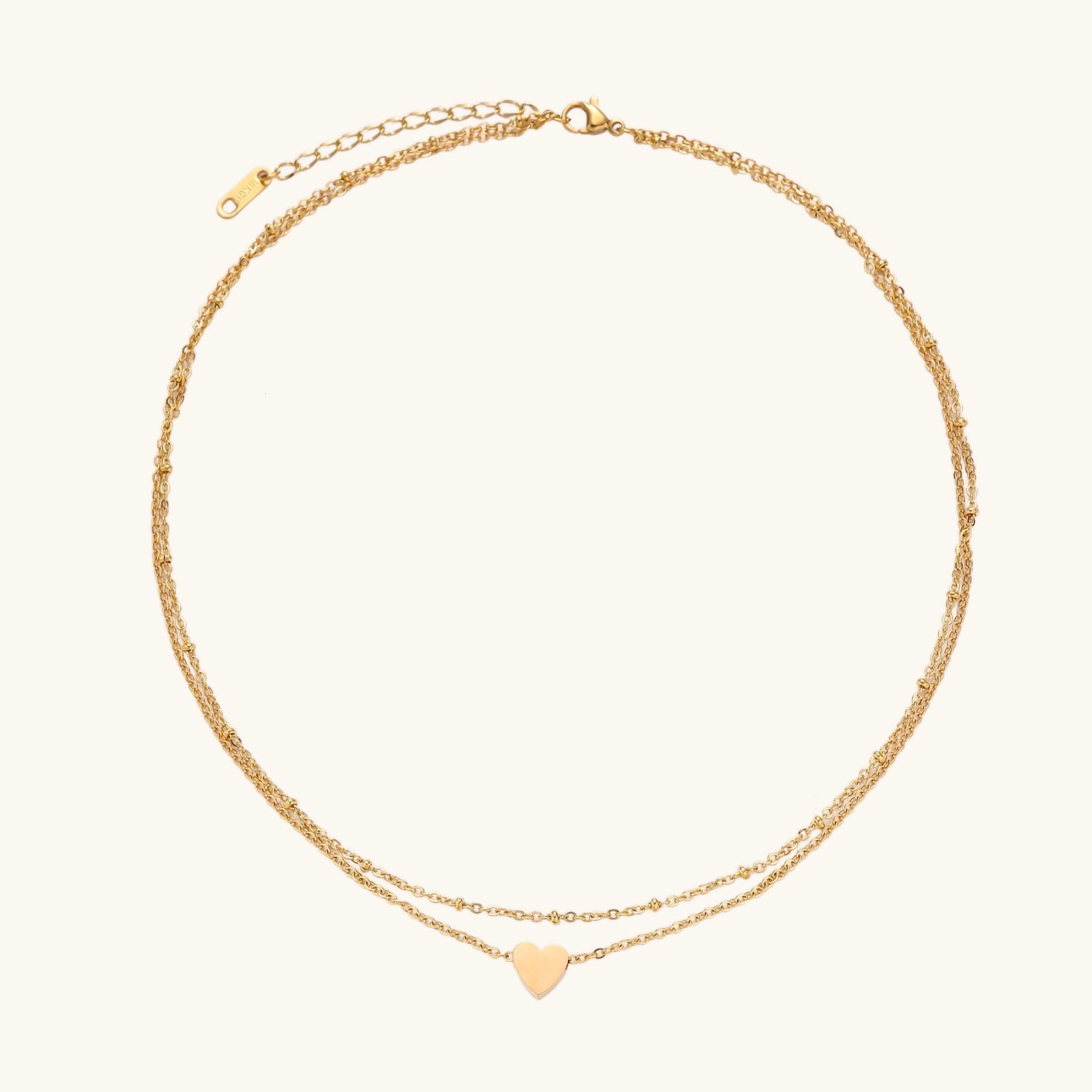 Angled view of Layered Heart Necklace by Averuna Jewellery