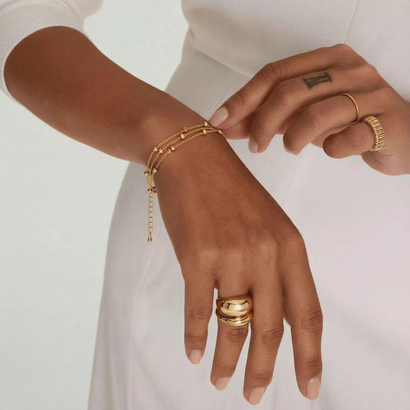 Lifestyle view of Golden Orbit Bracelet by Averuna Jewellery