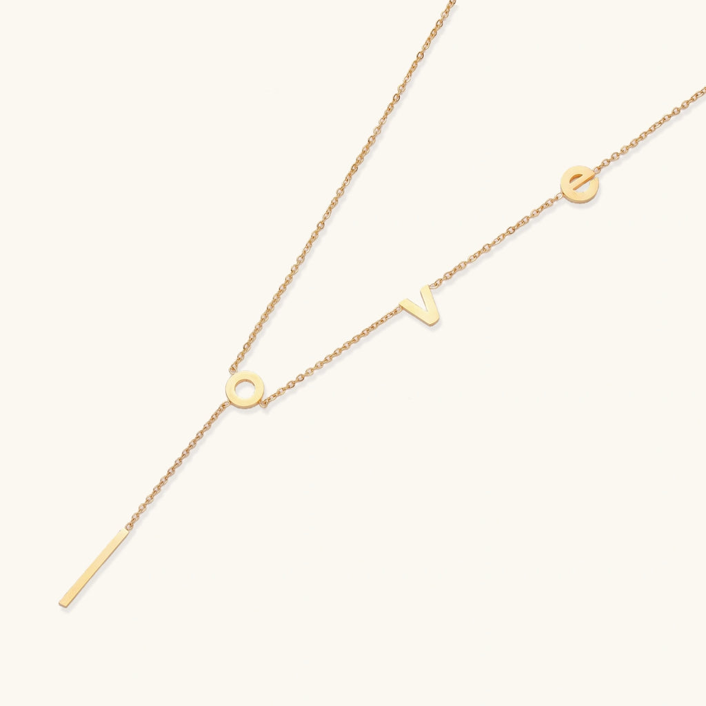 Angled view of Love Letter Lariat Necklace by Averuna Jewellery
