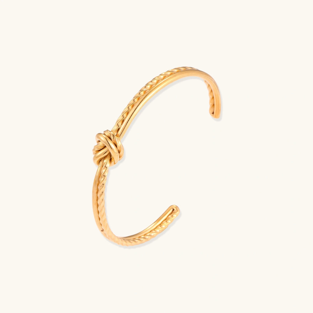Angled view of Golden Knot Cuff Bracelet by Averuna Jewellery