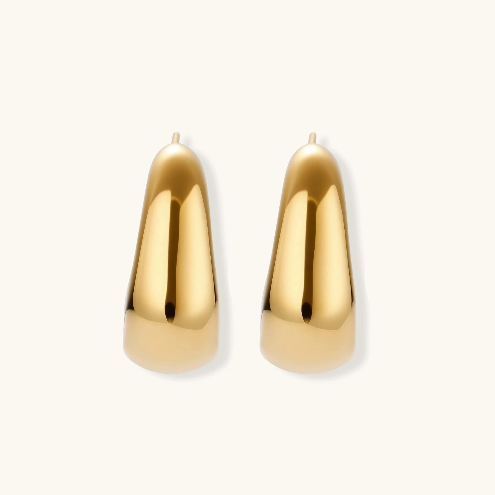 Close-up detail of Sculpted Curve Huggie Earrings by Averuna Jewellery