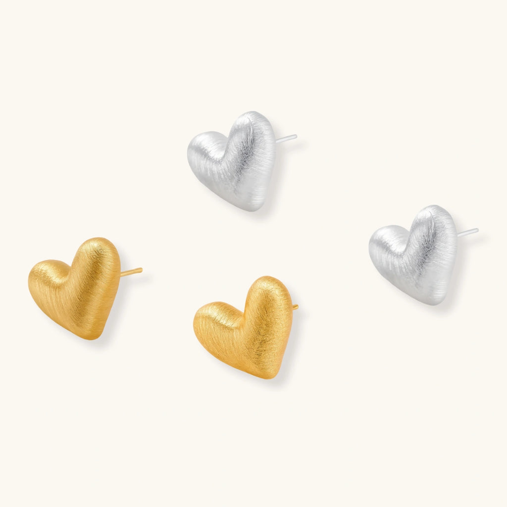 Close-up detail of Brushed Heart Stud Earrings by Averuna Jewellery
