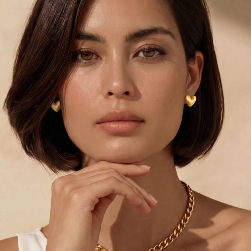 Lifestyle view of Brushed Heart Stud Earrings by Averuna Jewellery