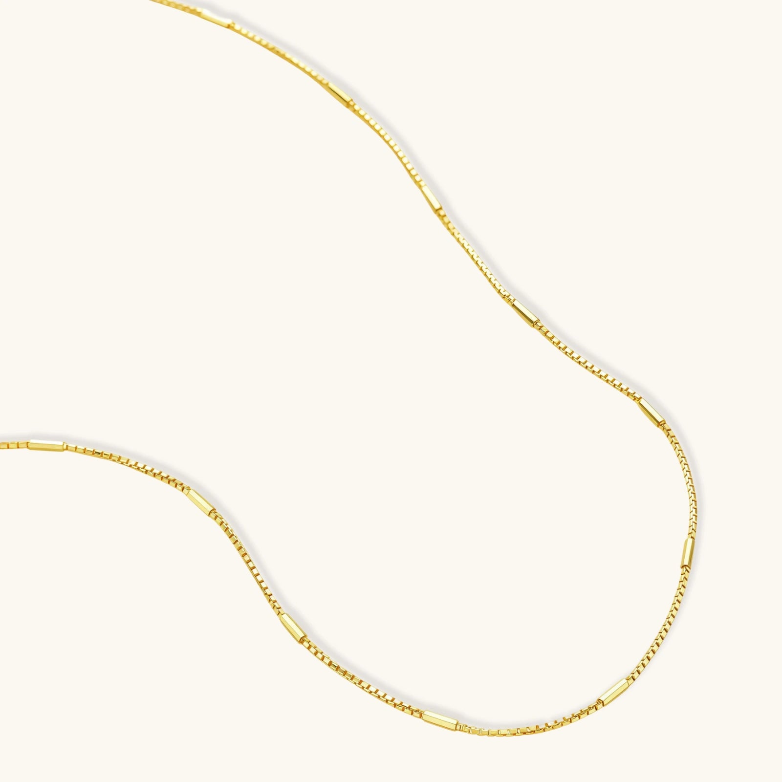 Close-up detail of Golden Minimalist Chain Necklace by Averuna Jewellery