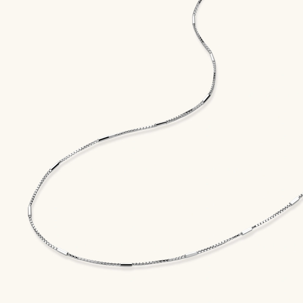 Angled view of Rhythm Chain Necklace by Averuna Jewellery