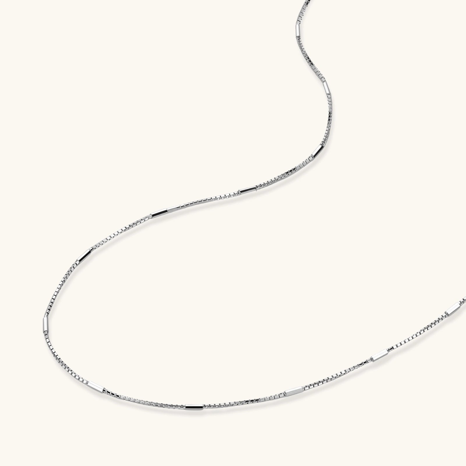 Angled view of Rhythm Chain Necklace by Averuna Jewellery