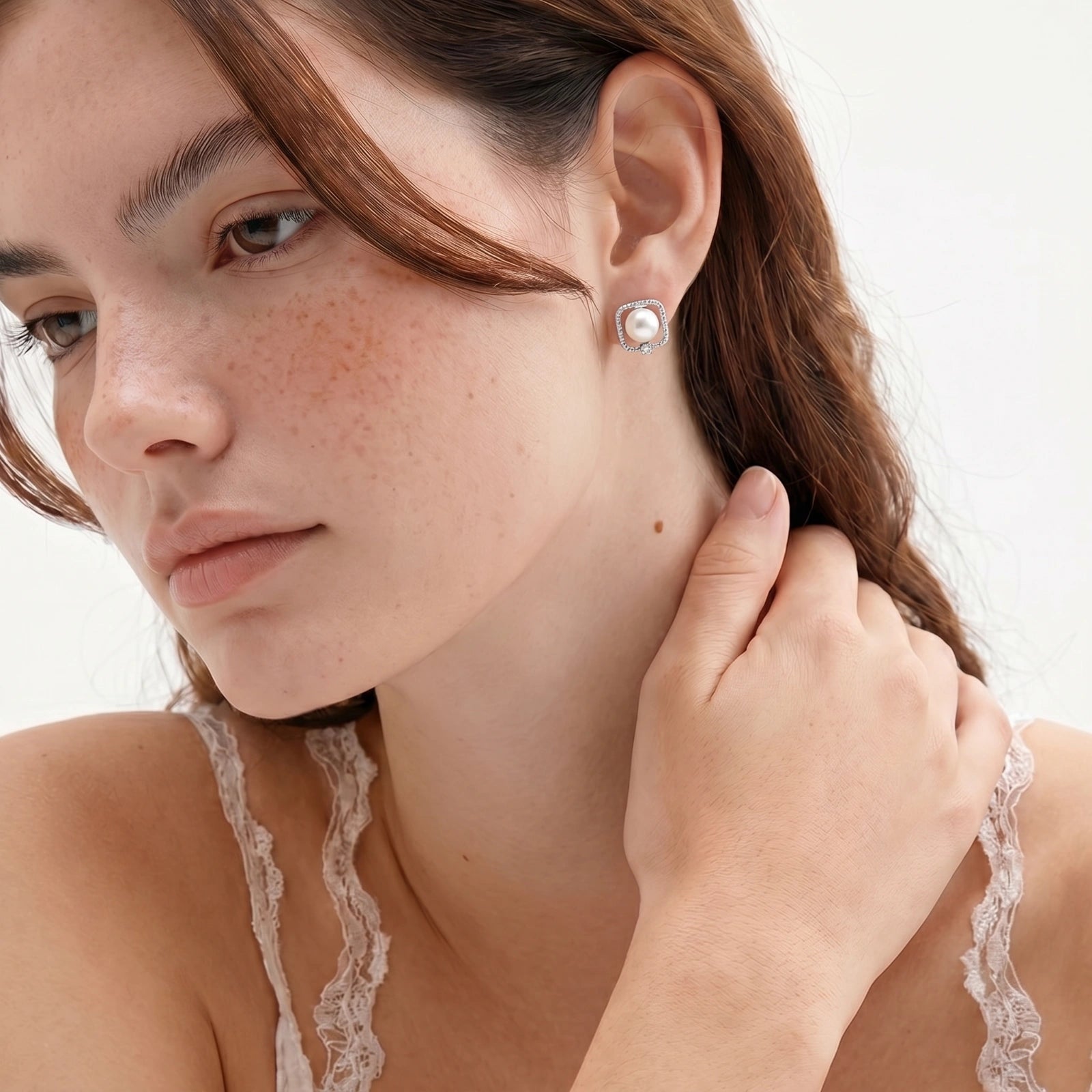 Lifestyle view of Pearl Halo Stud Earrings by Averuna Jewellery