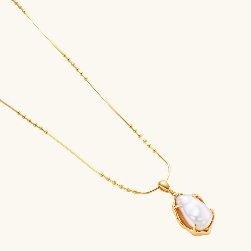 Angled view of Baroque Pearl Pendant Necklace by Averuna Jewellery