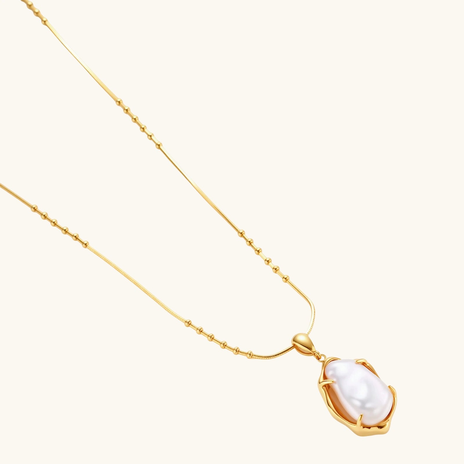 Angled view of Baroque Pearl Pendant Necklace by Averuna Jewellery