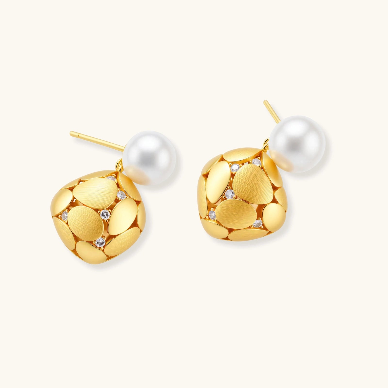 Angled view of Petal Drop Pearl Earrings by Averuna Jewellery
