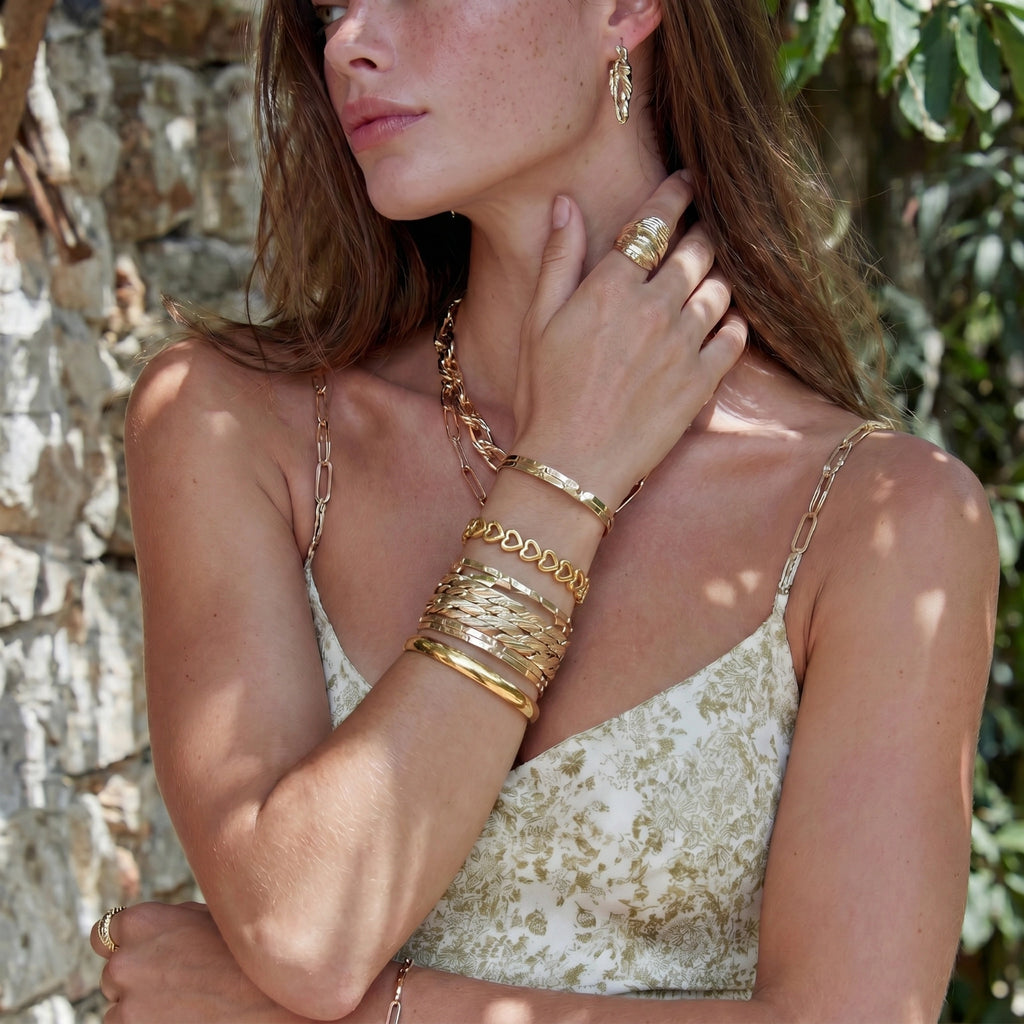 Lifestyle view of Linked Hearts Bangle by Averuna Jewellery