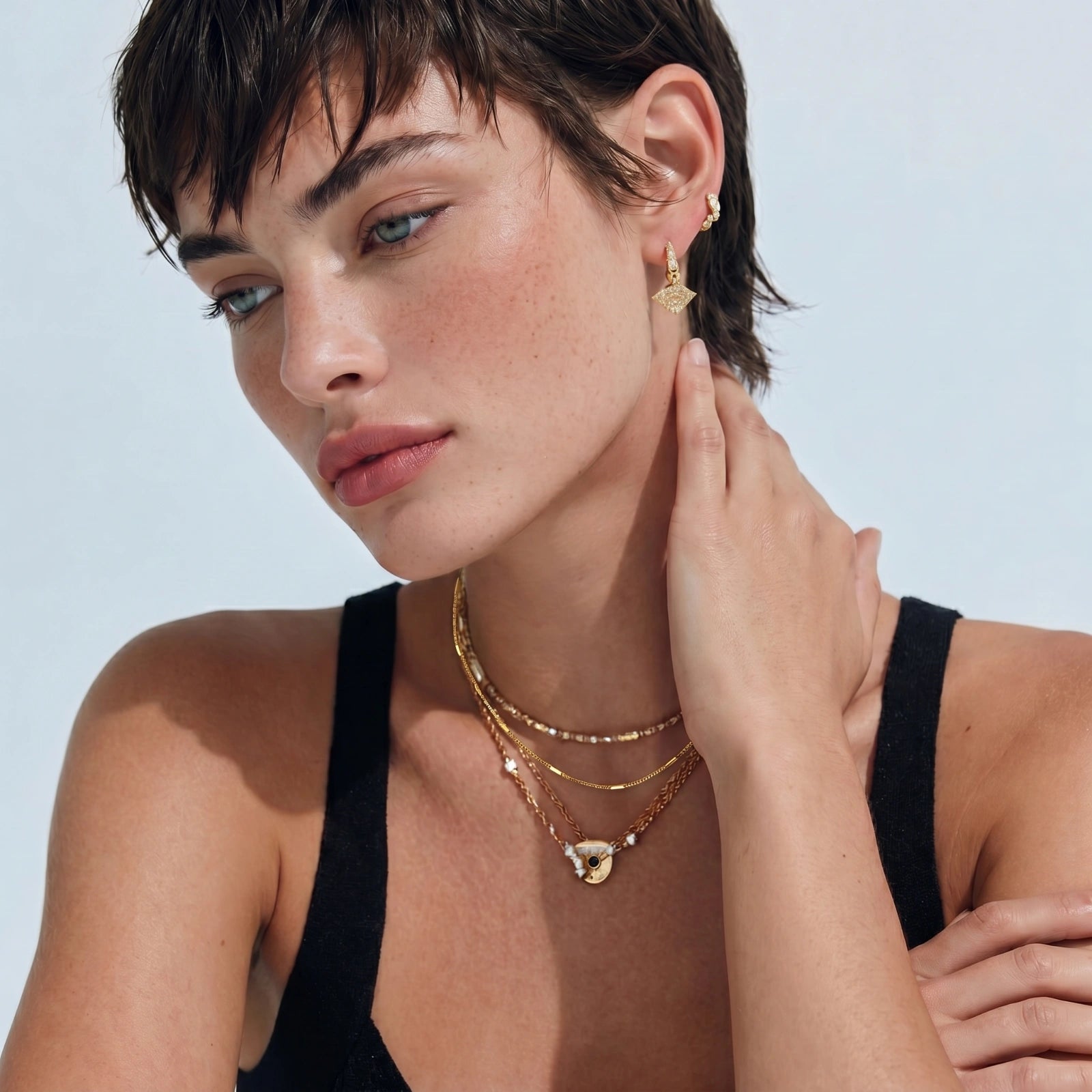Angled view of Golden Minimalist Chain Necklace by Averuna Jewellery